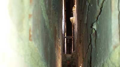 Inside a cavity wall during insulation removal